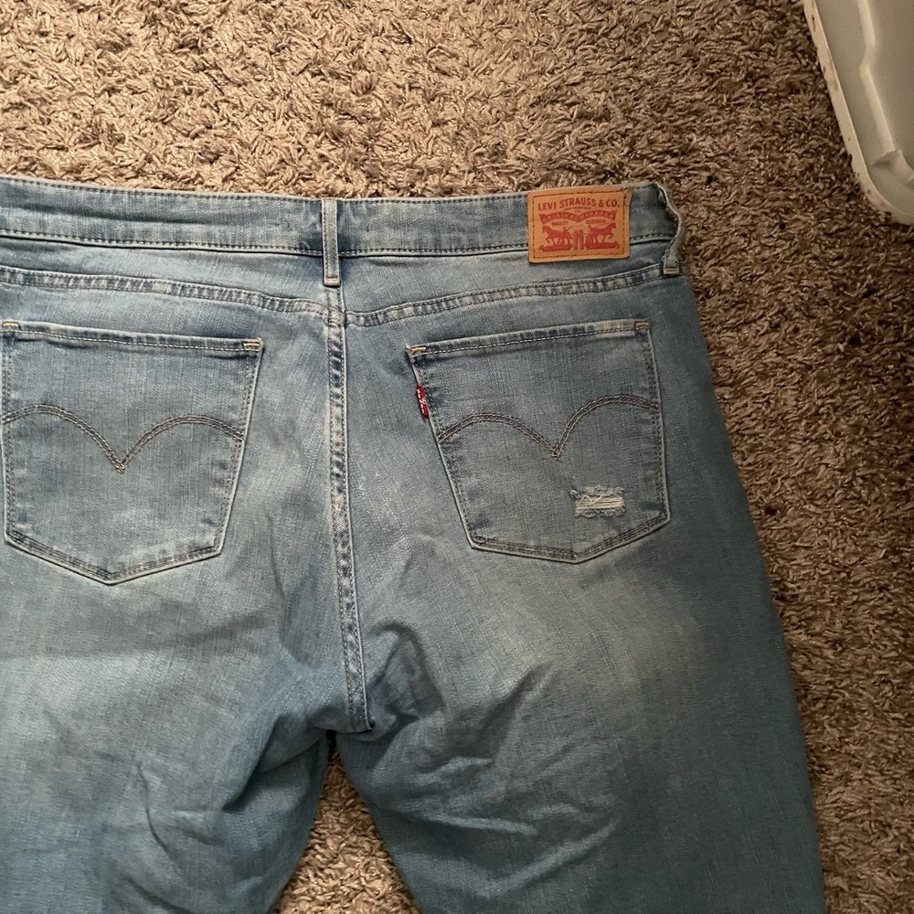 Levi’s light distressed jeans